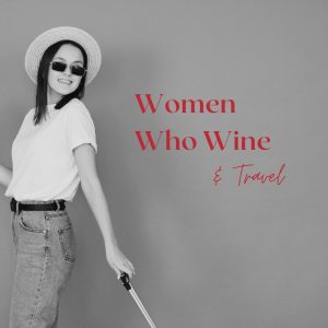 Image of young women with suitcase. And words Women Who Wine and Travel.